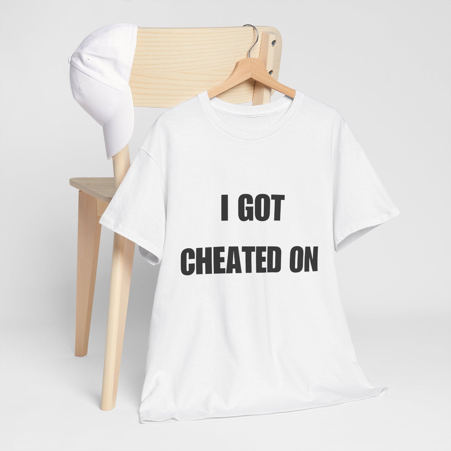 I GOT CHEATED ON Unisex Heavy Cotton Tee